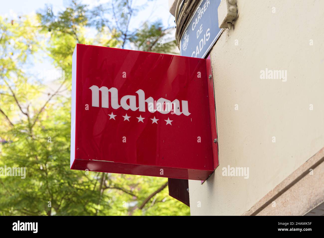 VALENCIA, SPAIN - DECEMBER 09, 2021: Mahou is a Spanish brewery founded in Madrid in 1890 Stock Photo