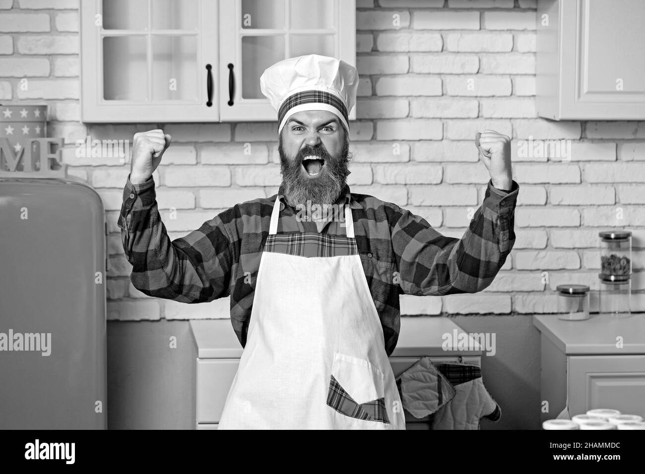 Master chef, cook or baker very happy of good taste with hand Stock Photo Alamy