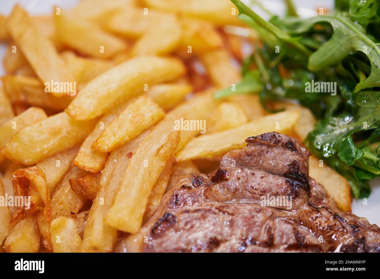 Steak and French fries Stock Photo
