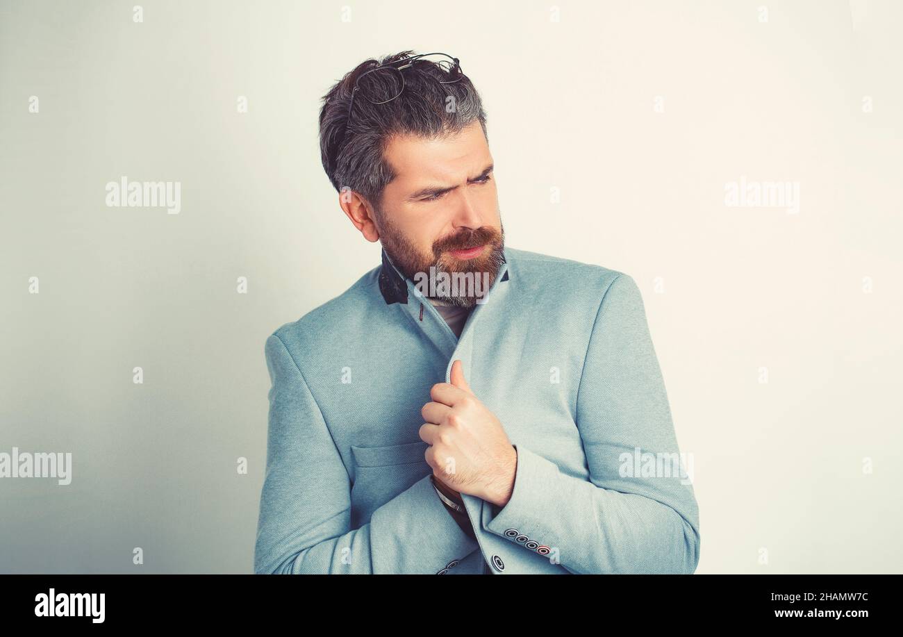 The business bearded man feeling the cold. Stock Photo
