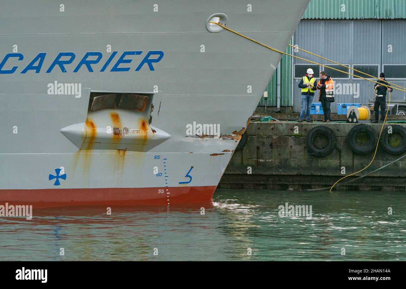Personnel from the Swedish Coast Guard use an underwater drone (ROV) to ...