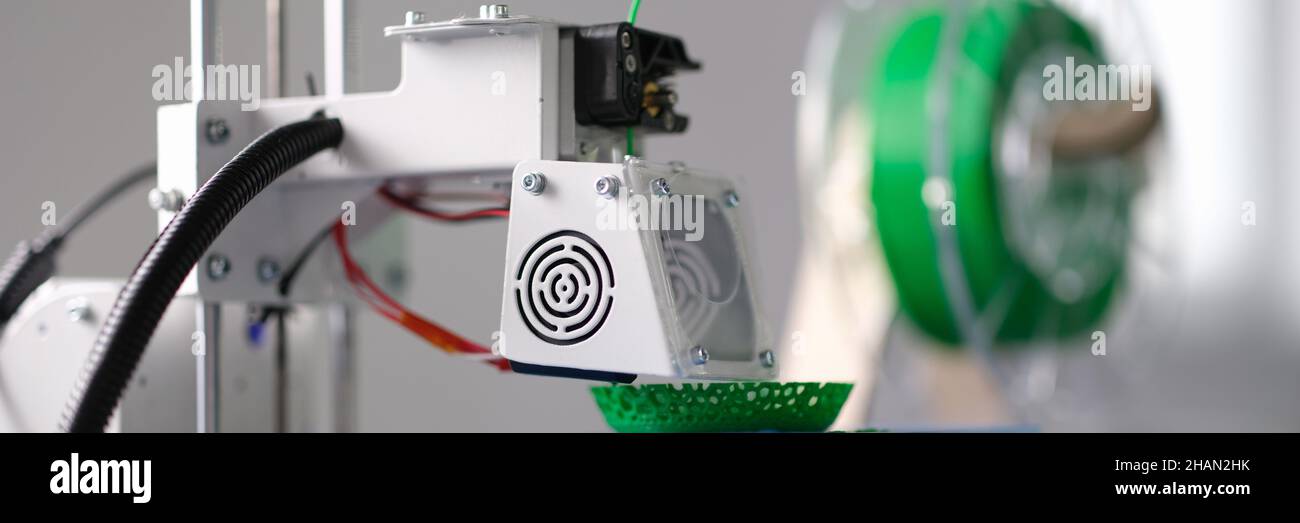 3D printing machine operation closeup. 3D rapid prototype processing Stock Photo