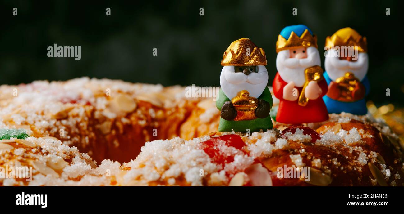 the three wise men, melchior, caspar and balthazar, on top of a roscon