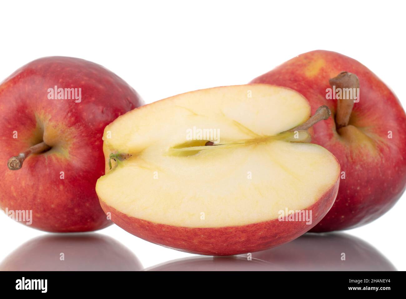 https://c8.alamy.com/comp/2HANEY4/one-half-and-two-whole-organic-red-apples-close-up-isolated-on-white-2HANEY4.jpg