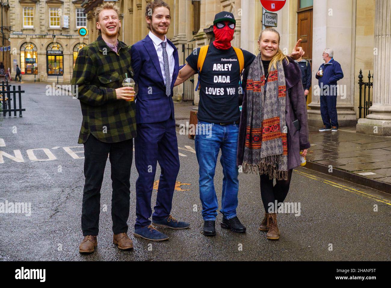 Milo Ponsford, left, Sage Willoughby, second left, Jake Skuse , second right in mask, and Rhian Graham right, accused of criminal damage over the toppling of the statue of slave trader Edward Colston, outside Bristol Crown Court. Picture date: Tuesday December 14, 2021. Stock Photo