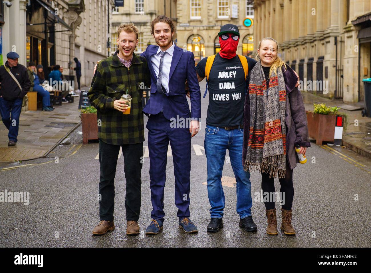 Milo Ponsford, left, Sage Willoughby, second left, Jake Skuse , second right in mask, and Rhian Graham right, accused of criminal damage over the toppling of the statue of slave trader Edward Colston, outside Bristol Crown Court. Picture date: Tuesday December 14, 2021. Stock Photo