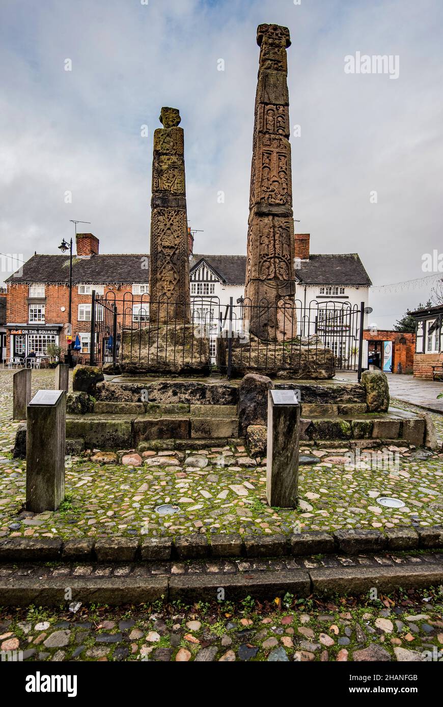 The Sandbach Anglo-Saxon high crosses in the pretty,cobbled, market square at Sandbach in Cheshire. Stock Photo