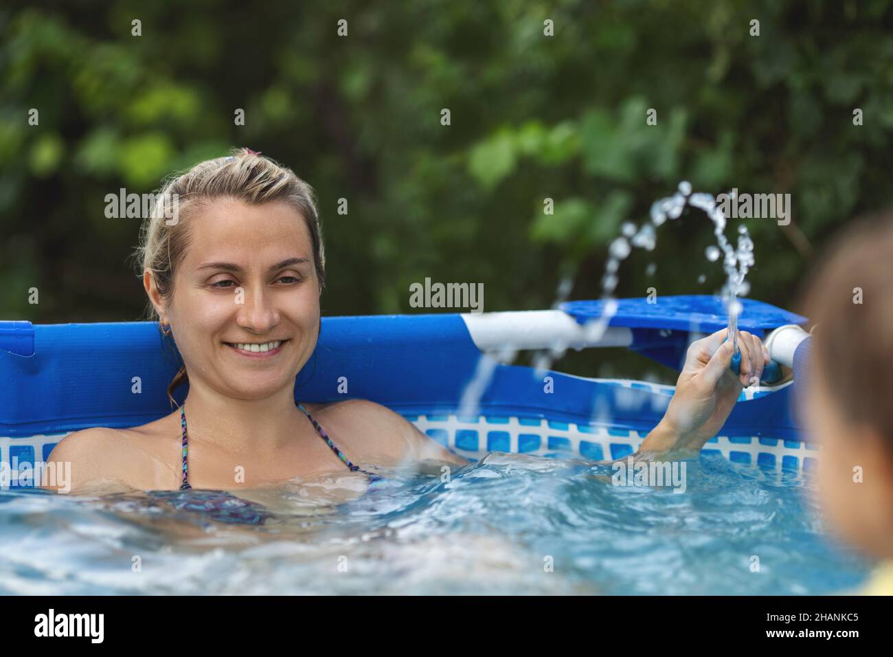 Beautiful little baby splashing water hi-res stock photography and ...