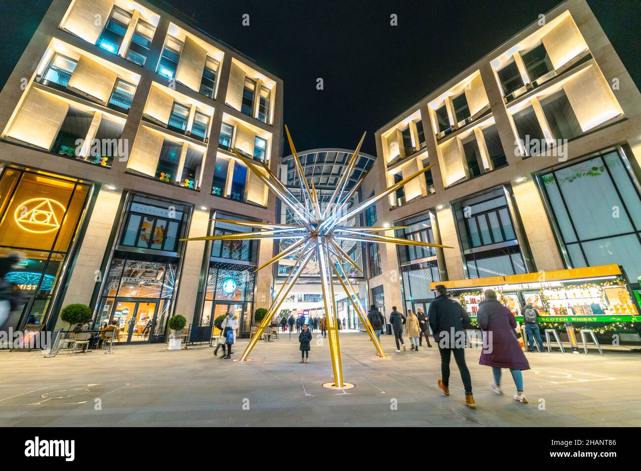 Night view of exterior of St James Quarter shopping and entertainment centre with Christmas decorations in Edinburgh, Scotland, UK Stock Photo