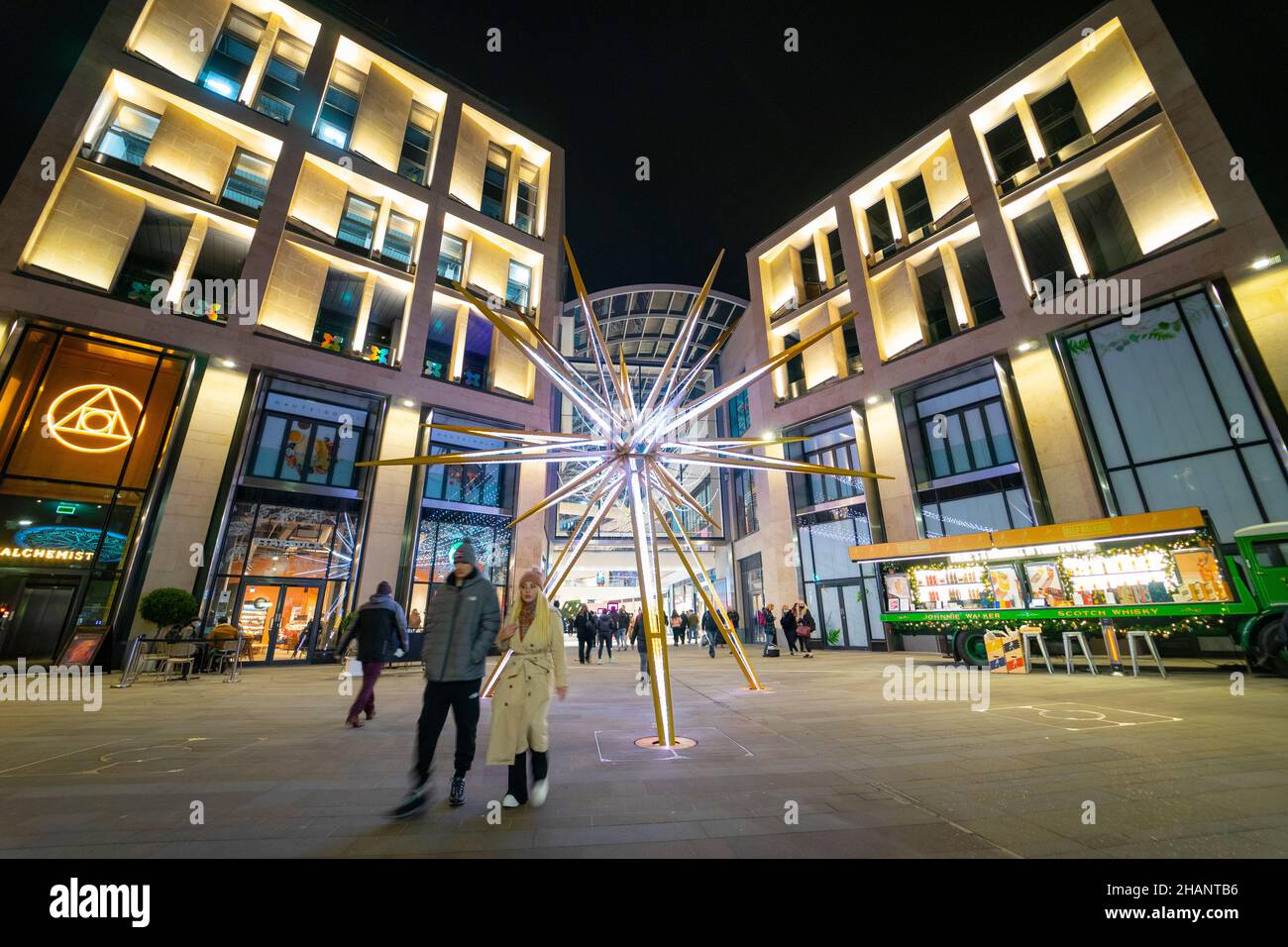 Night view of exterior of St James Quarter shopping and entertainment centre with Christmas decorations in Edinburgh, Scotland, UK Stock Photo