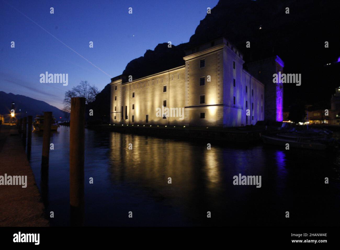 Beautiful images photographed at sunset in the medieval town of Riva del Garda, in Trentino Alto Adice, Italy, on Lake Garda at night during the Chris Stock Photo