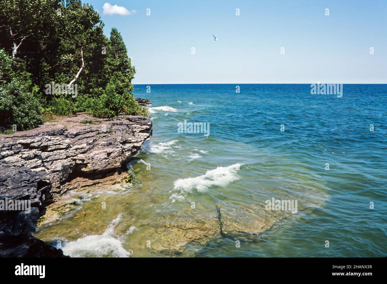 The rugged, rocky coastline of Lake Michigan along the Door County peninsula in Wisconsin. Stock Photo