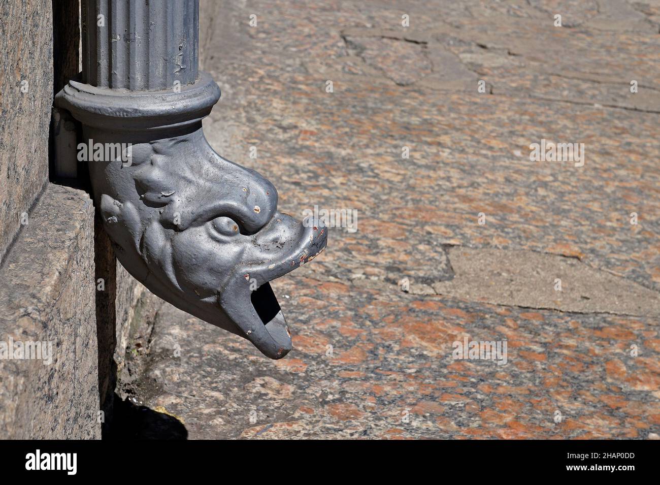 Metallic downspout in shape of beast head, Gargoyle drain, Downtown Rio