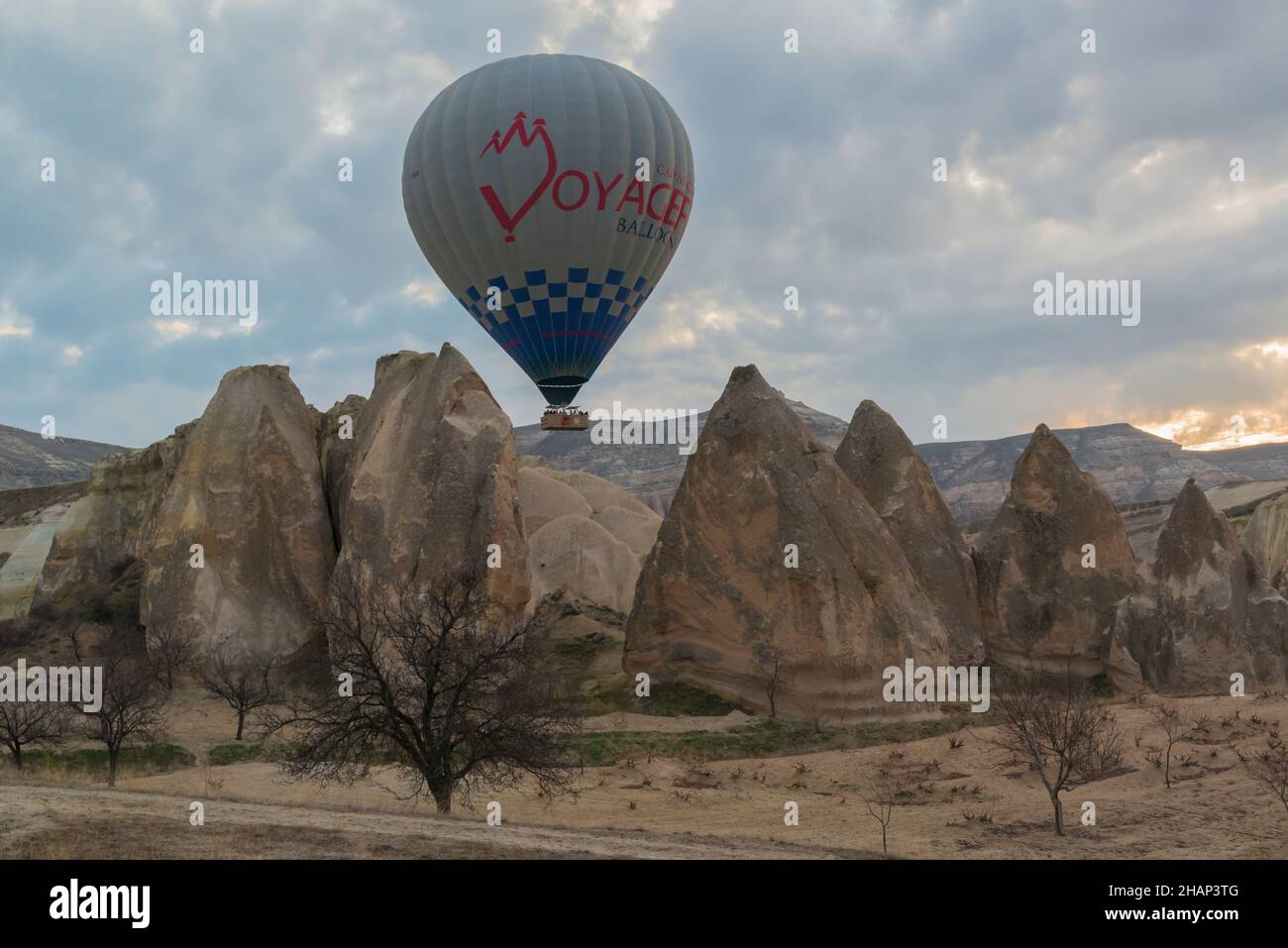 A hot-air balloon above the fairy chimneys of Cappadocia,  Central Anatolia, Turkey Stock Photo
