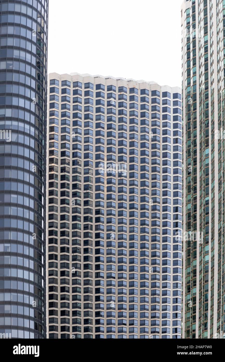Juxtaposition of three different tall buildings and their window styles in Chicago Illinois. Stock Photo