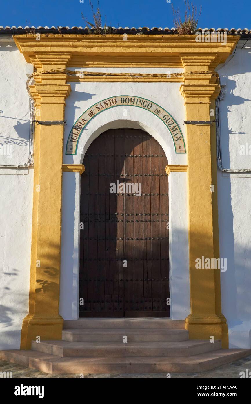 Main door of the Church of Santo Domingo in the village of Benalauria in the Genal Valley, Malaga. Andalusia, Spain. Stock Photo