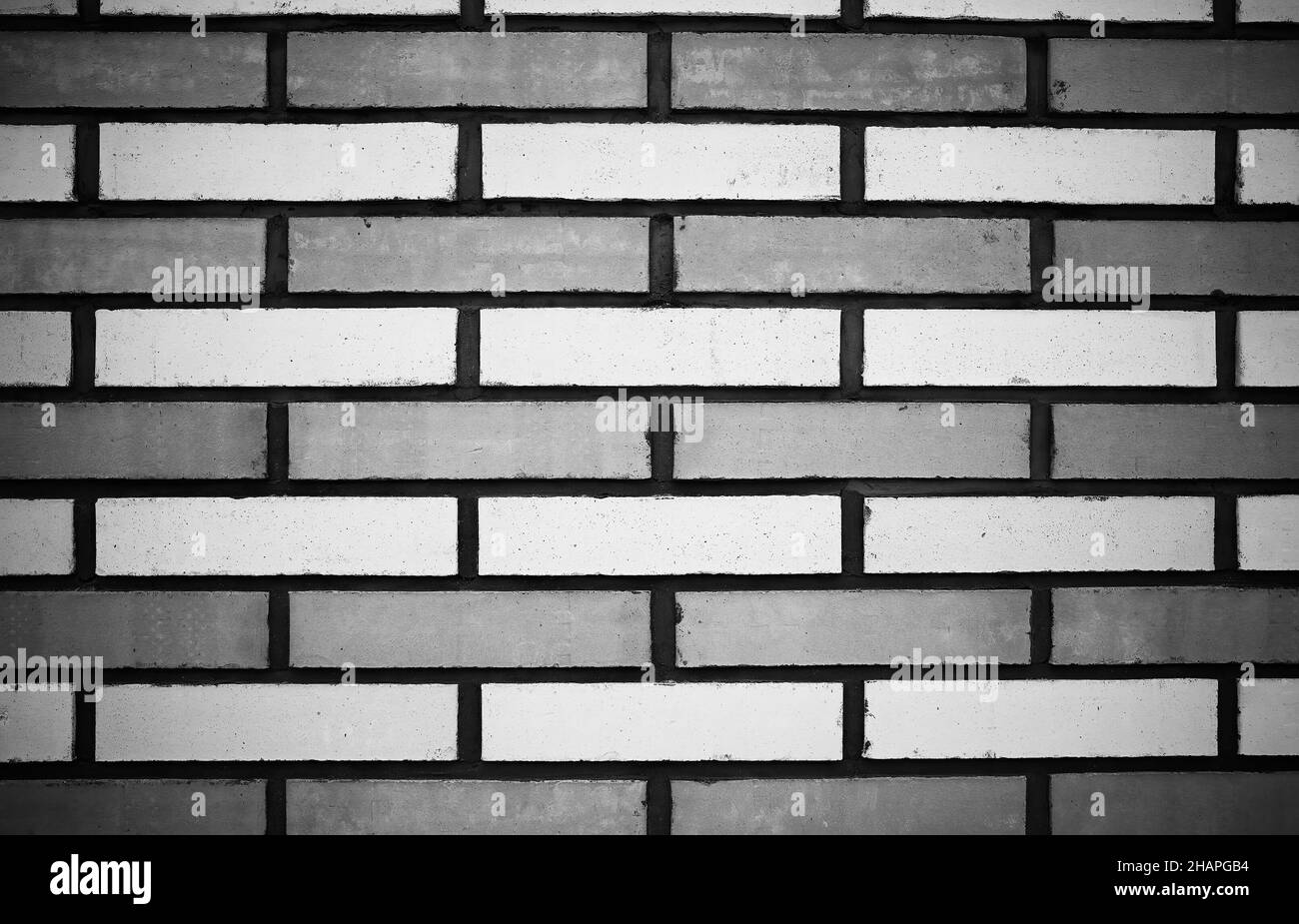 Brick wall texture at city street background Stock Photo - Alamy