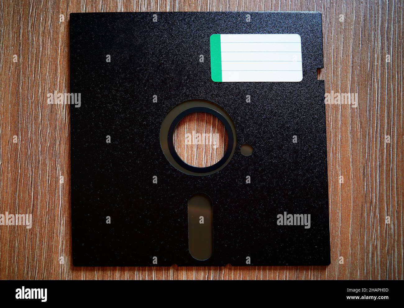 Floppy disc with green label background Stock Photo
