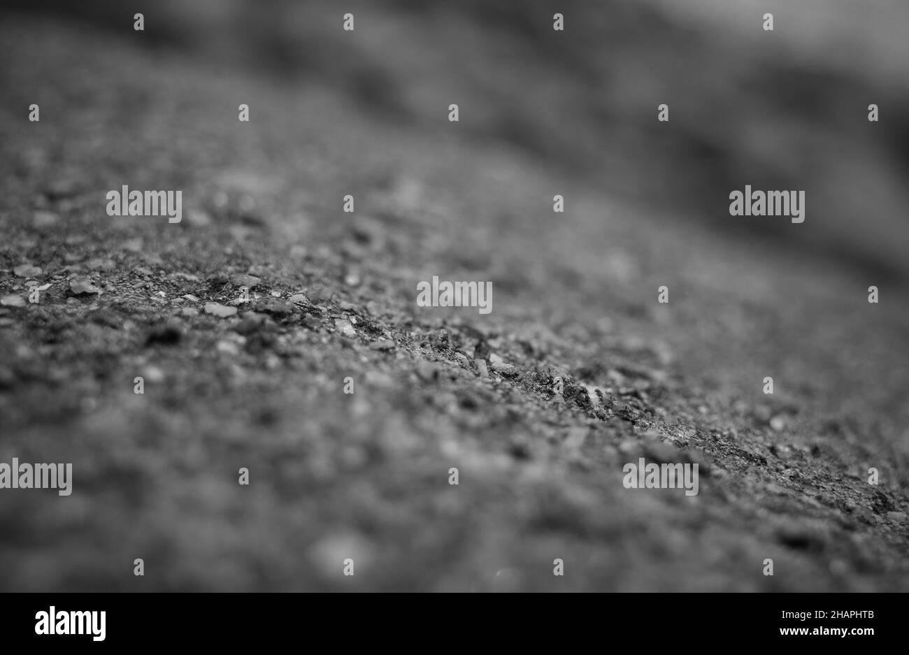 Tilted black & white ground bokeh background Stock Photo - Alamy