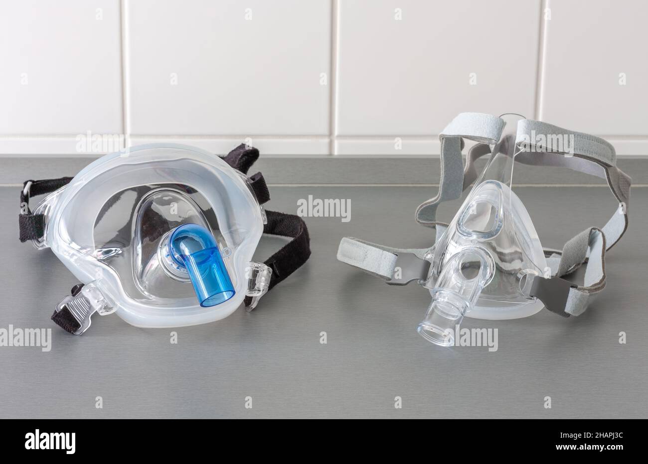 Two types of noninvasive ventilation face mask, close up view, in ICU