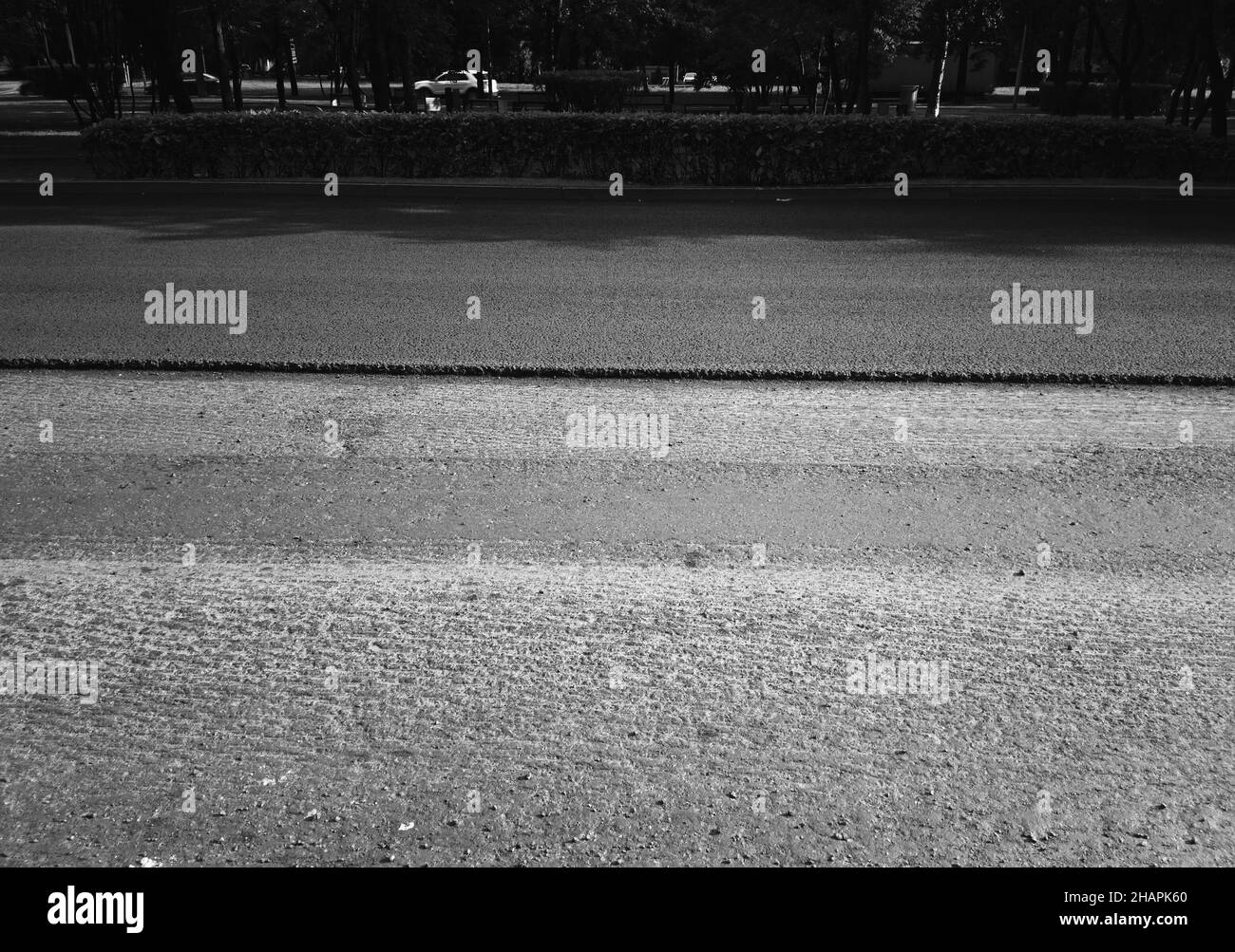 Asphalt embankment under maintenance backdrop Stock Photo - Alamy