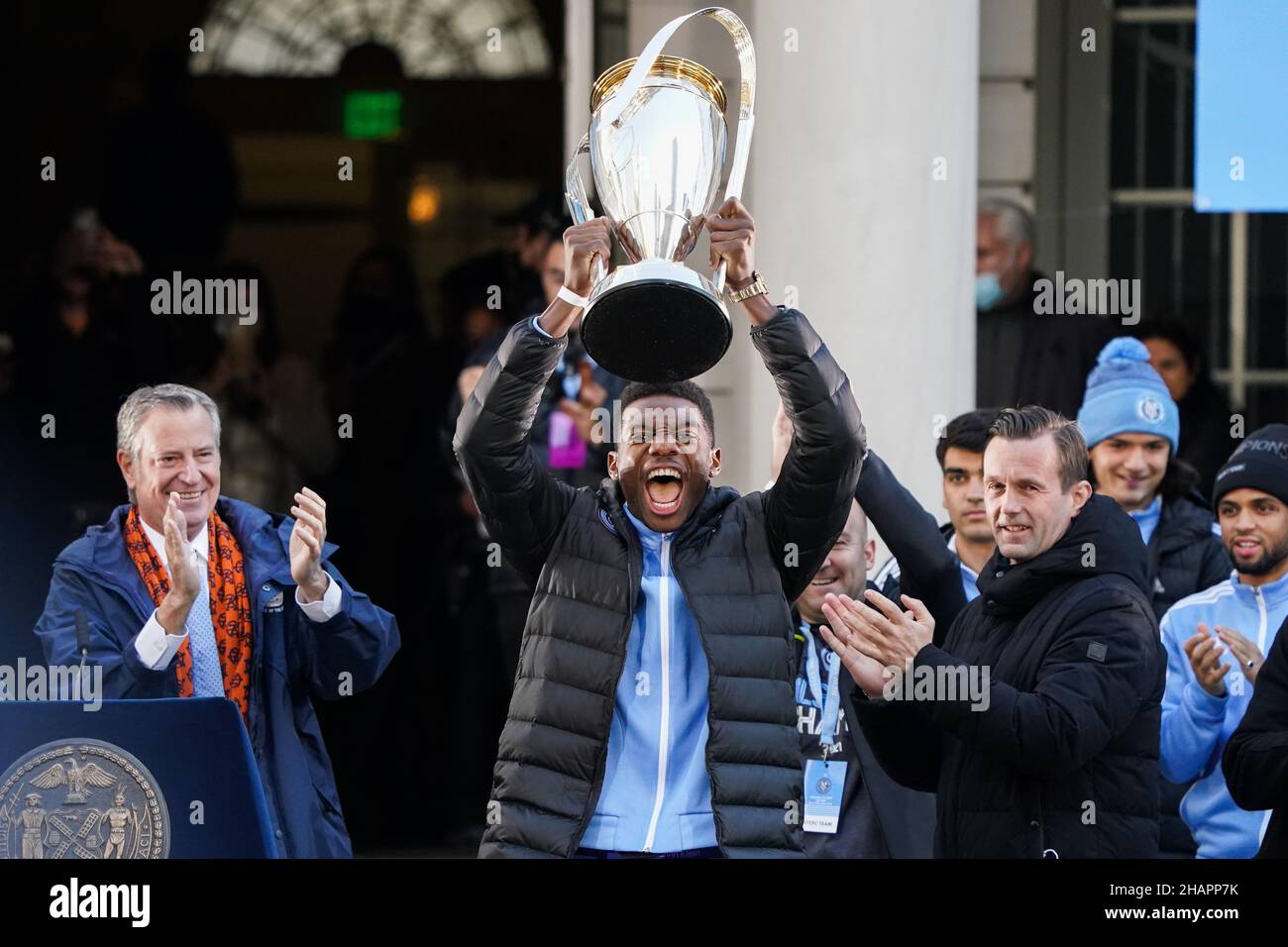 New York, USA. 14th Dec, 2021. NYCFC goalkeeper Sean Johnson lifts the MLS Cup trophy during the NYCFC MLS Cup victory celebration ceremony at City Hall in New York, USA. Credit: Chase Sutton/Alamy Live News Stock Photo