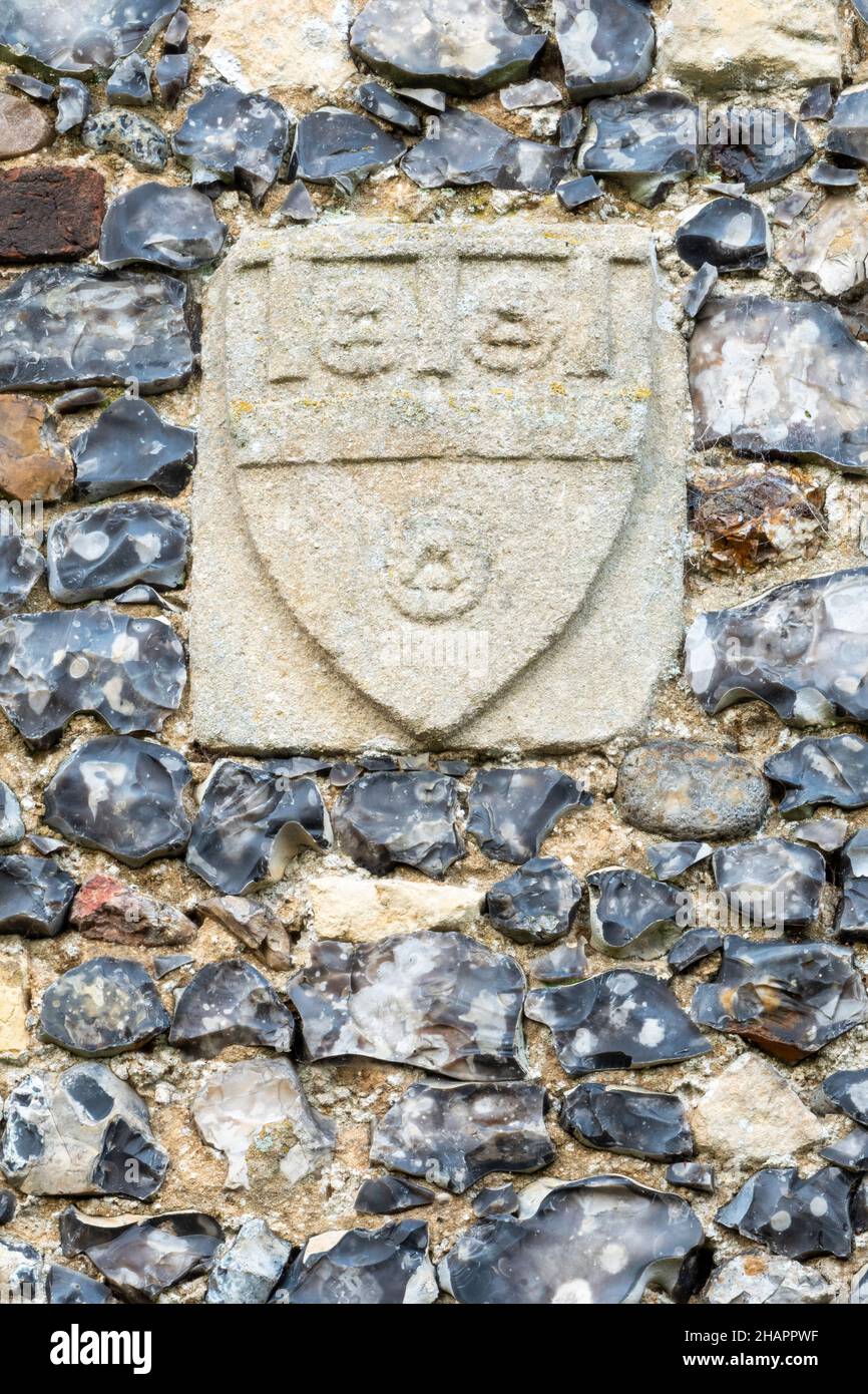 William de la Pole coat of arms above the priest's door at the Church ...