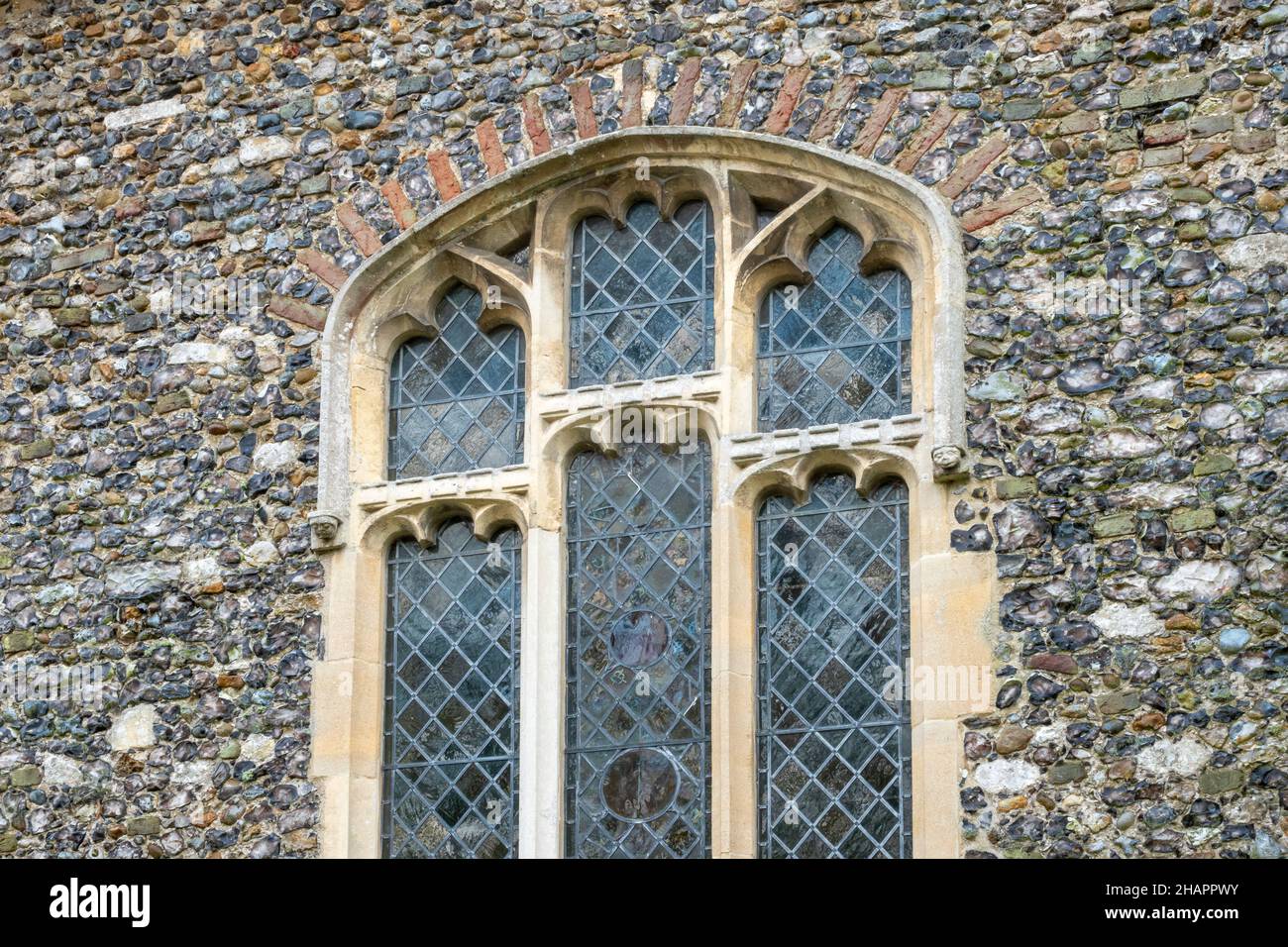 Exterior window detail at the Church of St Mary of the Assumption, Ufford, Suffolk Stock Photo