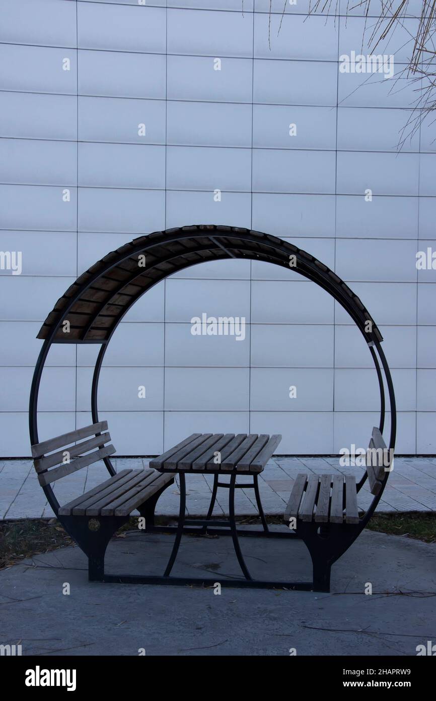 Benches in rain hi-res stock photography and images - Alamy