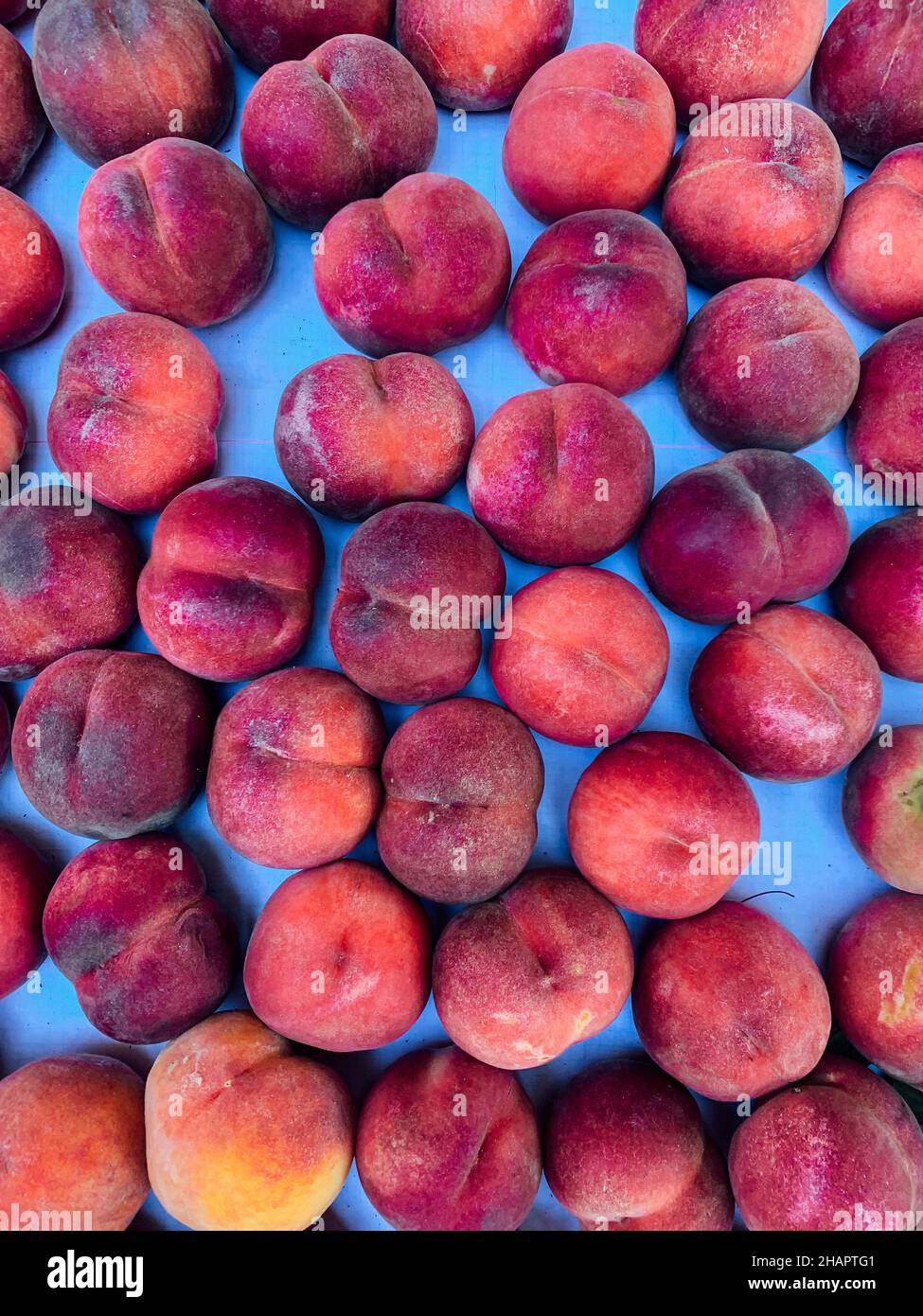 lots of sweet peaches to eat as a background Stock Photo