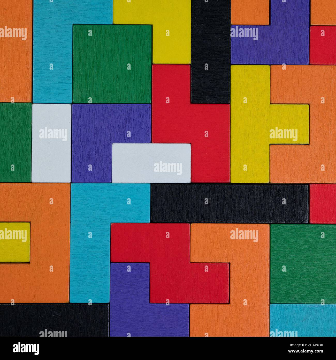 Colorful wooden puzzle pieces, put together Stock Photo Alamy