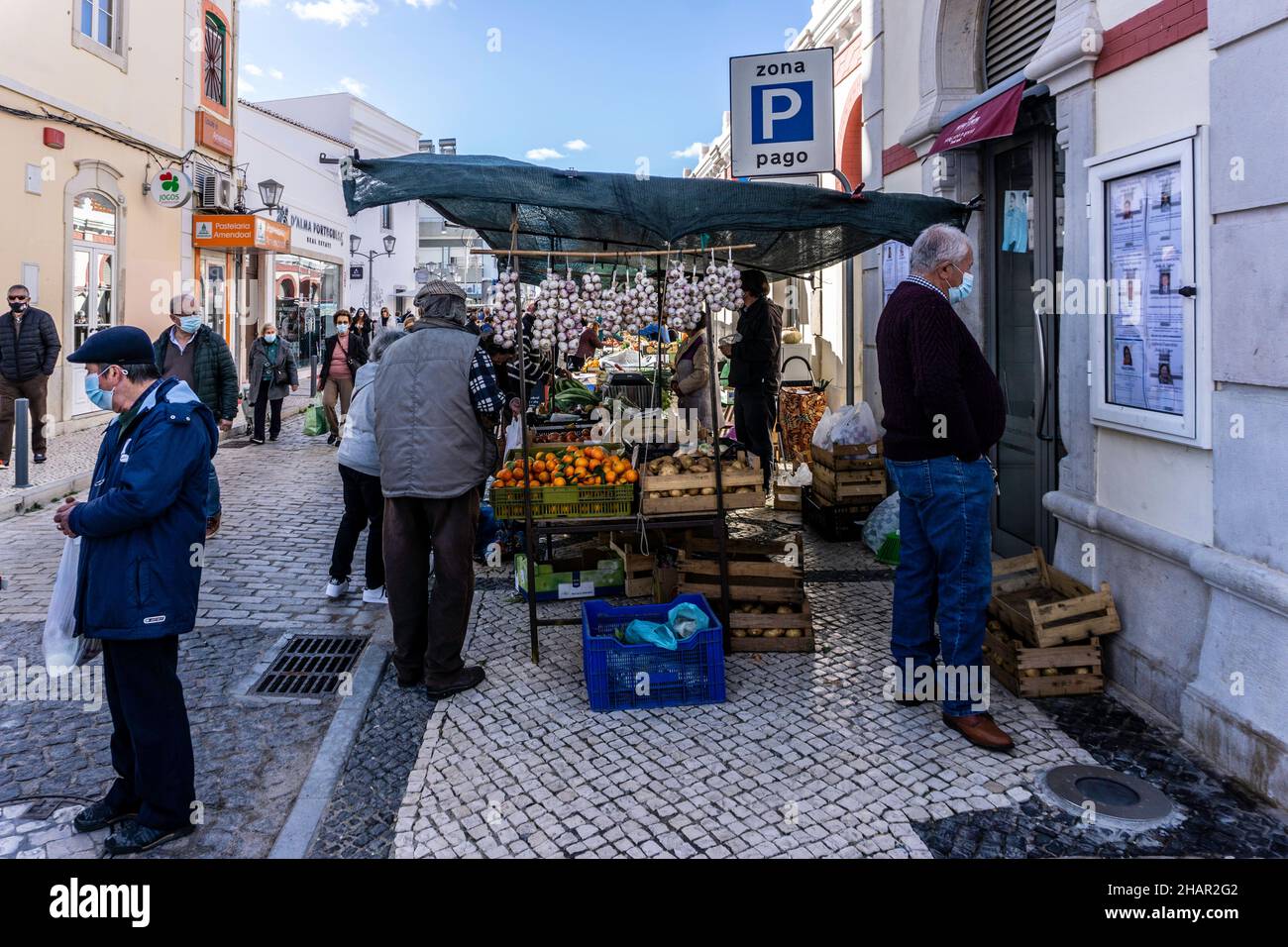 Local produce for sale outside the market hall area of Louie, Portugal. Stock Photo