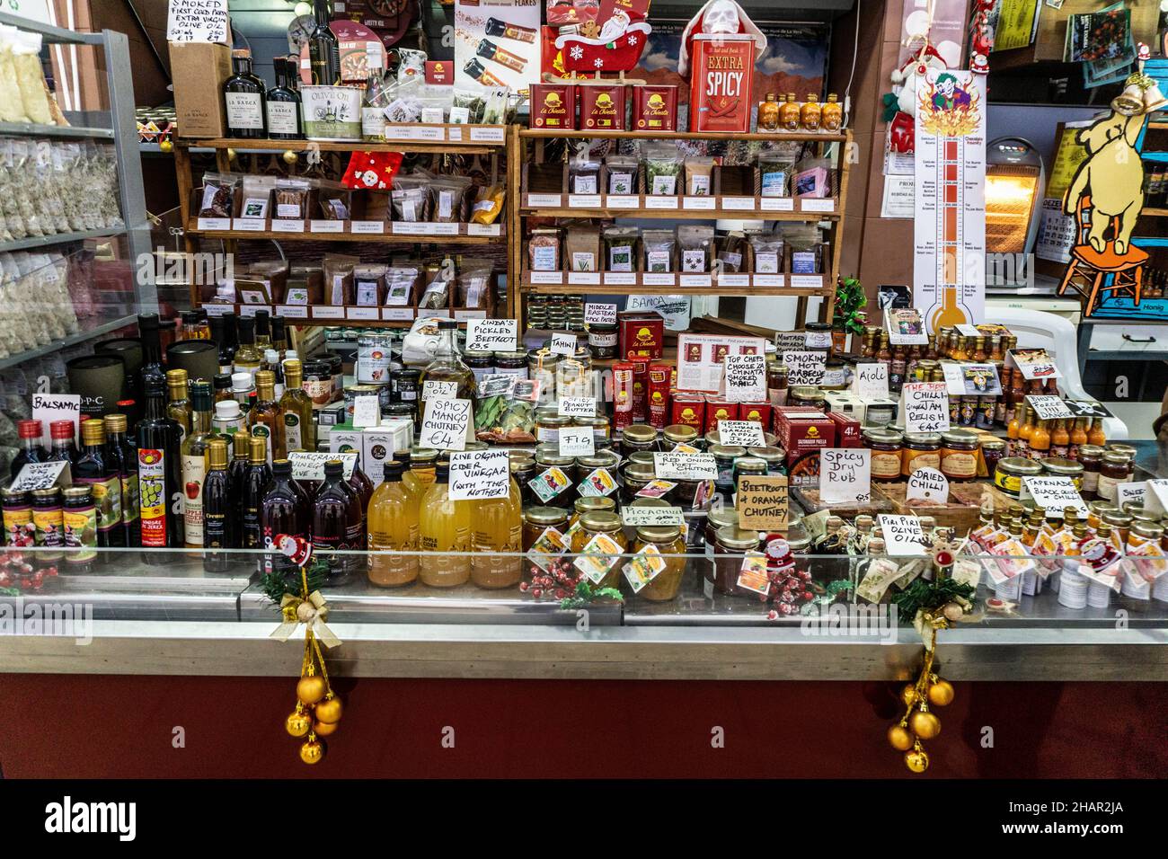 A selection of local produce including pomegranate vinegar, organic cider vinegar, chutney and much more  the market at Loule, Portugal. Stock Photo