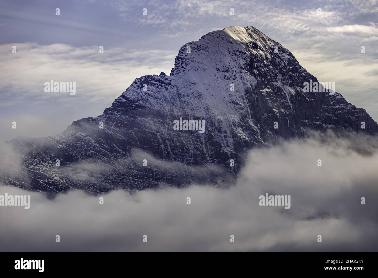 Lofty mountain in the clouds Stock Photo