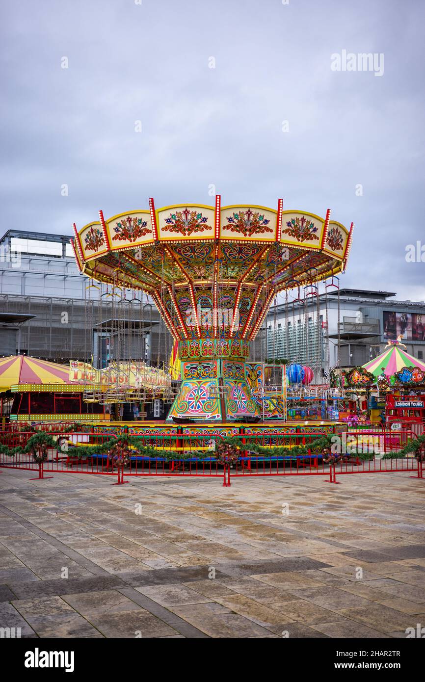 Bristol's winter wonderland with fairground rides in the Millennium Square, Bristol. (Dec21) Stock Photo