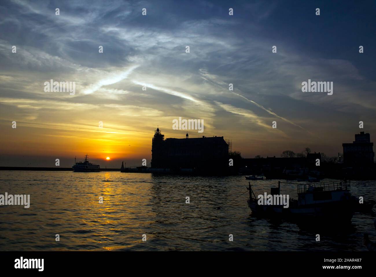 Haydarpasa Terminal Building in the Istanbul of Turkey in silhouette when sunset time. Stock Photo