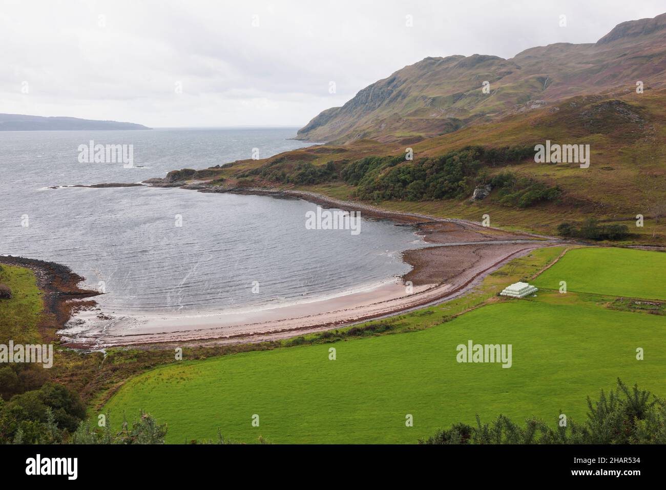 Looking across the beautiful bay known as Camas nan Geall from its panoramic viewing point on the Ardnamurchan Peninsula in West Scotland. Stock Photo