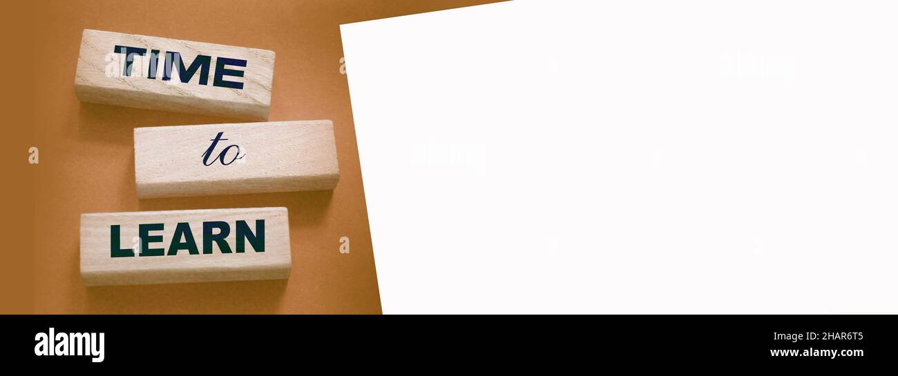 Time to Learn on wooden blocks put black. Education concept. Life-time ...