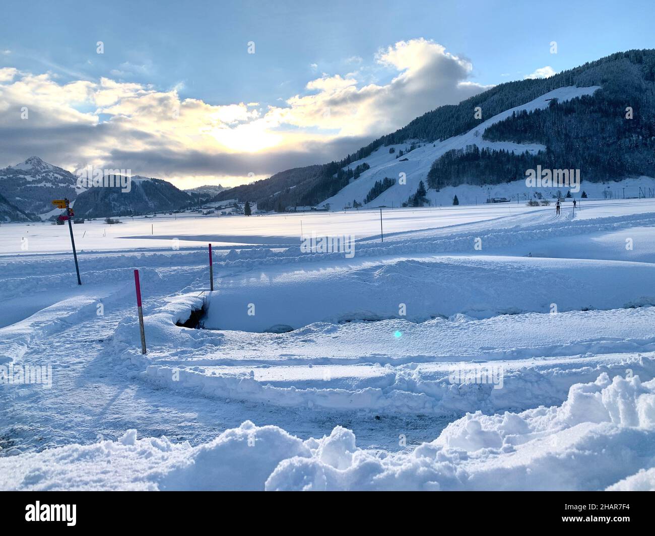 Cross country skiing trail and winter hiking trail in valley Studen in canton Schwyz in Switzerland. Ideal place for winter outdoor pursuits. Stock Photo