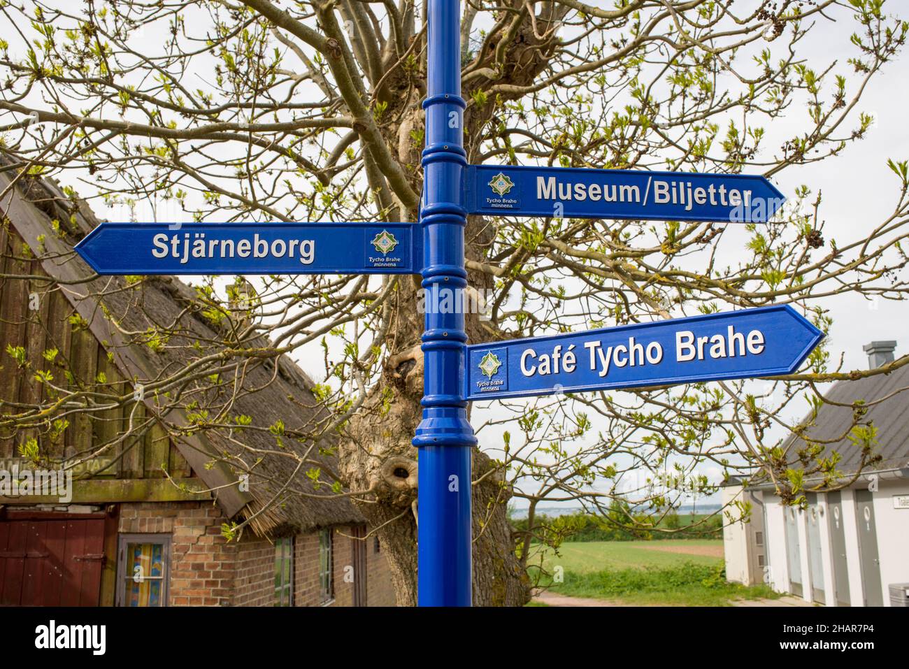 Road sign pointing to the Tycho Brahe Museum on Ven with Cafe, Stjärneborg and museum Stock Photo