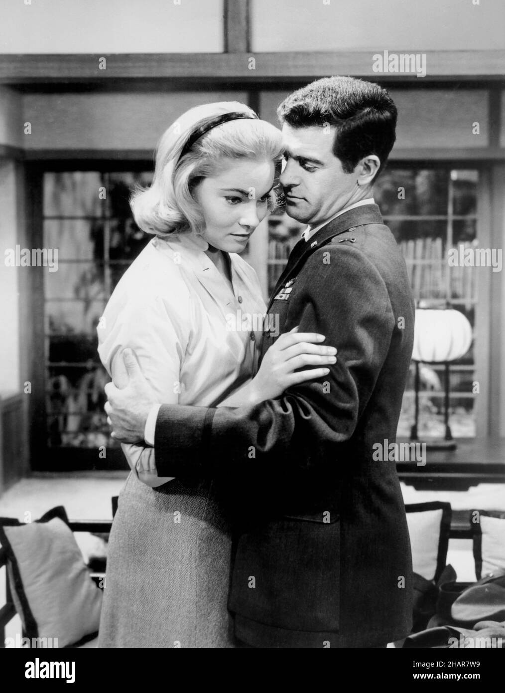 May Britt, Richard Egan, two people, man, male, woman, female, adults, Caucasian ethnicity, portrait, actor, actress, celebrity, entertainment, movie star, famous person, movies, film, 20th Century-Fox, The Hunters, 1958, 1950-1959, 1950's, 20th century, photography, historical, vintage, retro, black & white, b&w, b/w, vertical, GHIV Stock Photo