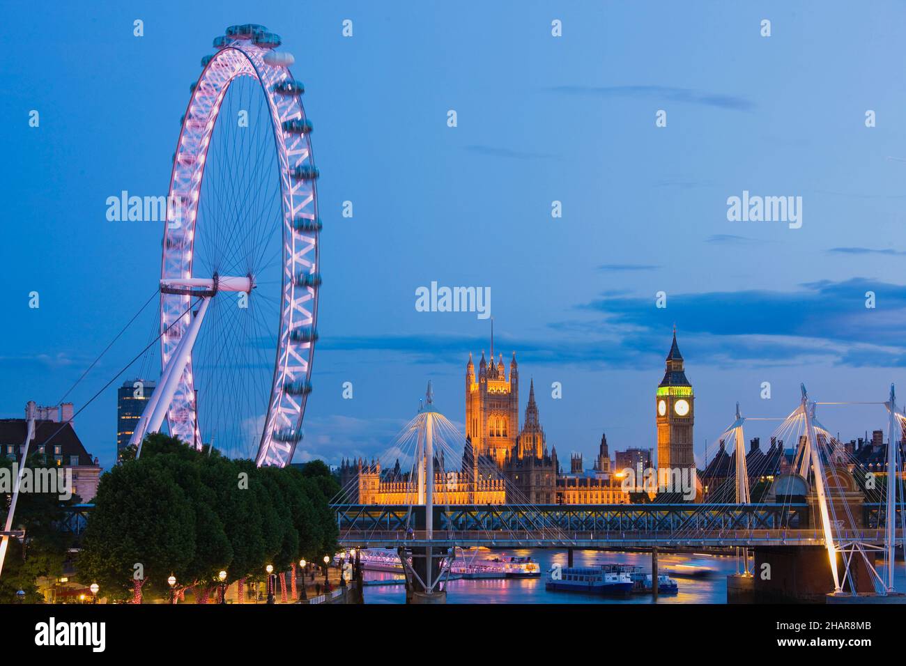 The London Eye, Houses of Parliament and the Thames River, London, United Kingdom Stock Photo