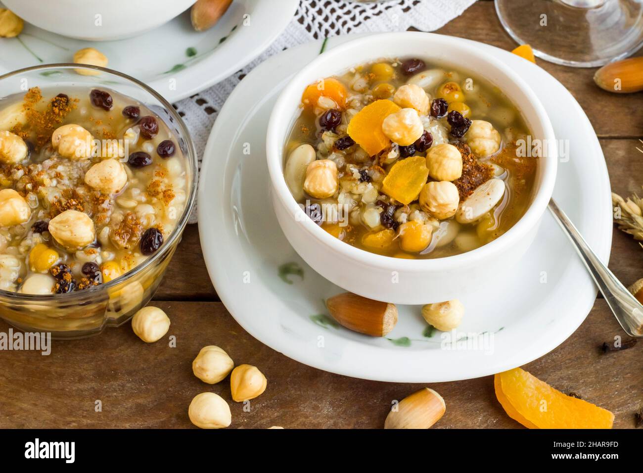 Traditional Turkish Dessert is Asure or  Noah's Pudding portioned in small bowls Stock Photo