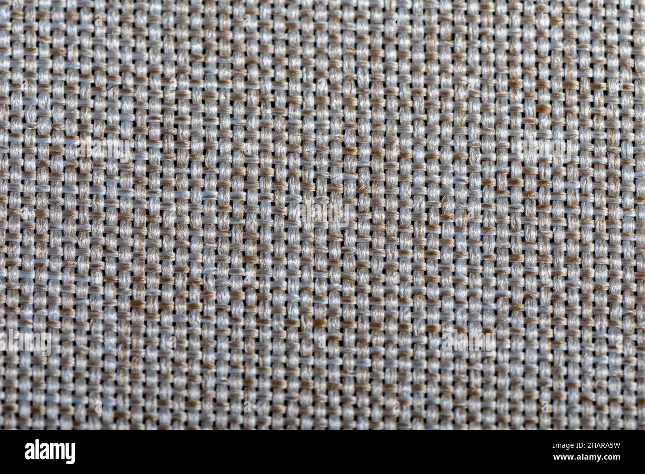 Brown fabric texture. Furniture upholstery textiles. Embossed pattern. Woven fibers. The material is soft touch. Minimalism concept. High detail macro Stock Photo