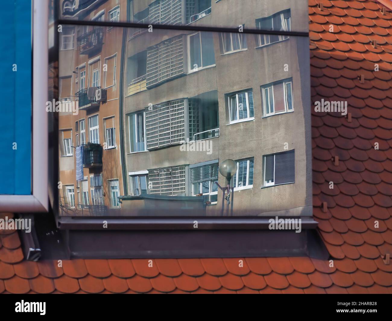 Mirror with building reflection on it Stock Photo - Alamy