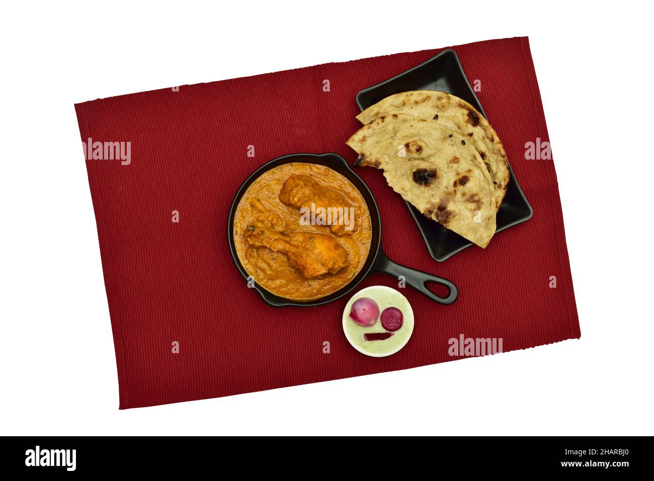Butter Chicken with Tandoori Roti and Chutney Onion isolated on White Background with Clipping Path Stock Photo