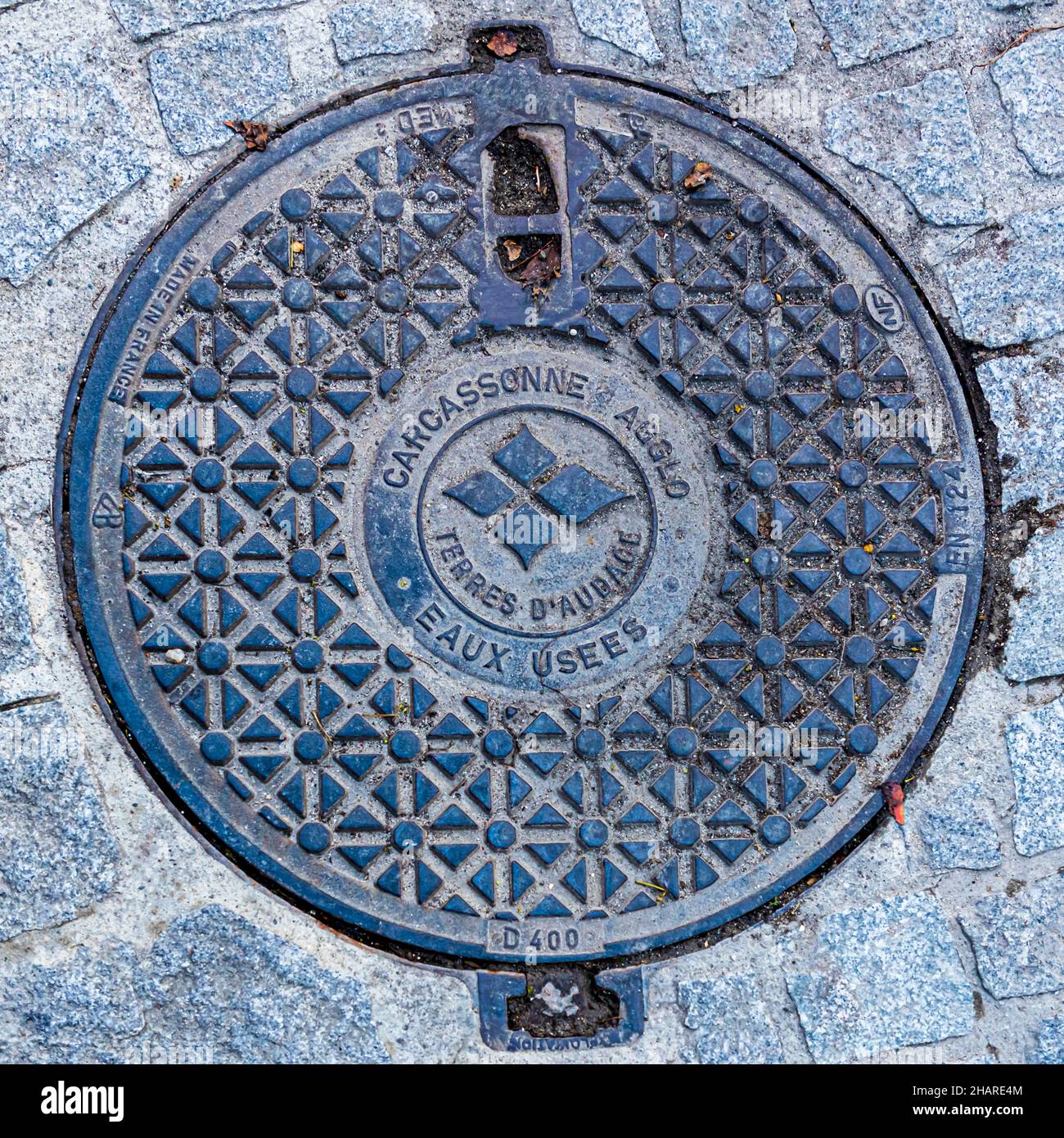 Manhole cover in Carcassonne, France Stock Photo