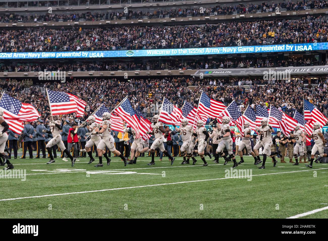 East Rutherford, United States of America. 11 December, 2021. U.S. West Point Military Academy Black Knights, run on to the field at the start of the annual Army-Navy football game at Metlife Stadium December 11, 2021 in East Rutherford, New Jersey. The U.S. Naval Academy Midshipmen defeated the Army Black Knights 17-13 in their 122nd matchup.  Credit: CDT Tyler Williams/U.S. Army Photo/Alamy Live News Stock Photo