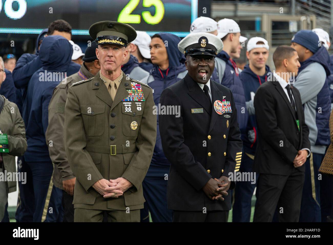 East Rutherford, United States of America. 11 December, 2021. Commandant of the Marine Corps, General David H. Berger, left, before the start of the annual Army-Navy football game at Metlife Stadium December 11, 2021 in East Rutherford, New Jersey. The U.S. Naval Academy Midshipmen defeated the Army Black Knights 17-13 in their 122nd matchup.  Credit: Stacy Godfrey/U.S. Navy Photo/Alamy Live News Stock Photo