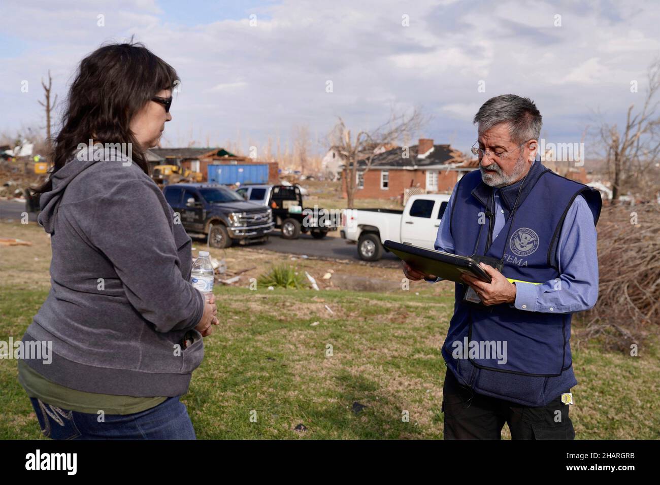 Dawson Springs, United States of America. 14 December, 2021. FEMA Disaster Survivors Assistance teams work with residents to provide assistance in the aftermath of devastating tornadoes that swept across four states destroying structures and killing dozens December 14, 2021 in Dawson Springs, Kentucky. Credit: Dominick Del Vecchio/FEMA/Alamy Live News Stock Photo